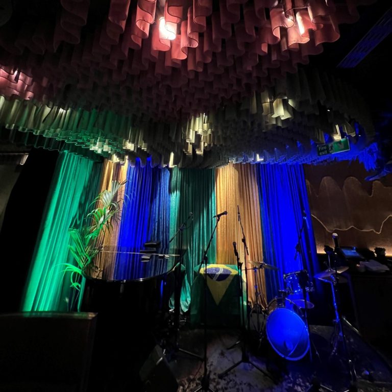 Velvet Stage Drapes London – Backdrop Setup Velvet stage drapes in London used for event backdrop with freestanding pipe and drape system