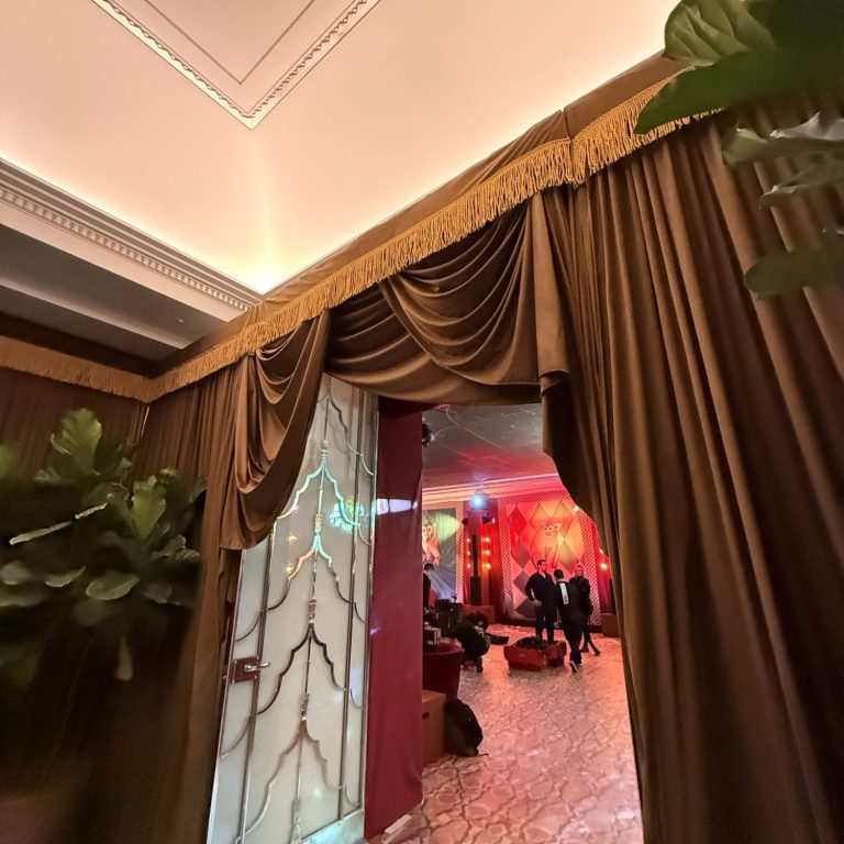 Burgundy velvet drapes London burgundy velvet draped entrance for a London corporate event