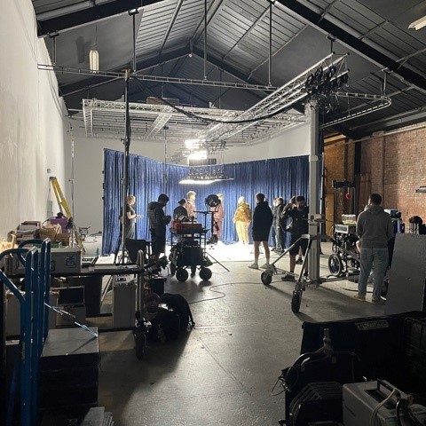 blue velvet drapes installed for London photo shoot