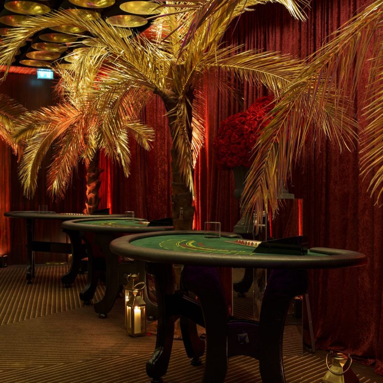 burgundy drapes for 007 themed casino event