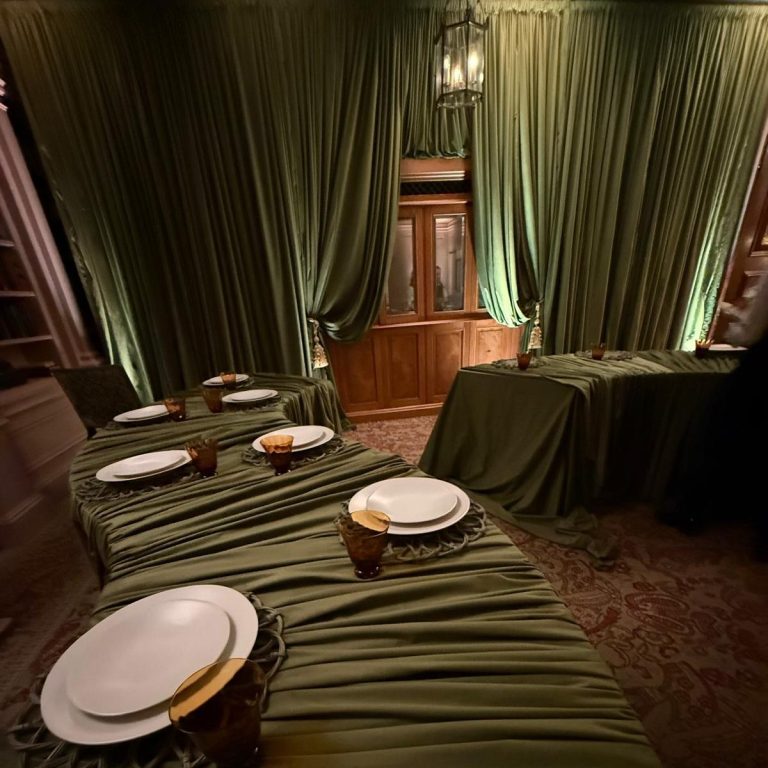 green velvet drapes installed for London wedding